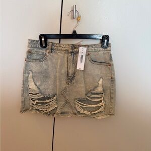 Ripped Light Blue Denim Mini Skirt - Casual Distressed Style